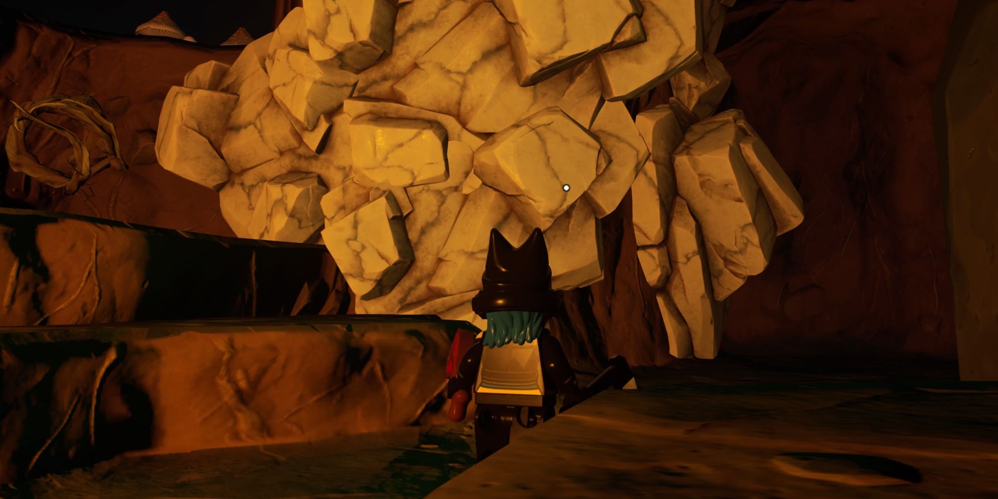a character beside some marble in a cave in lego fortnite